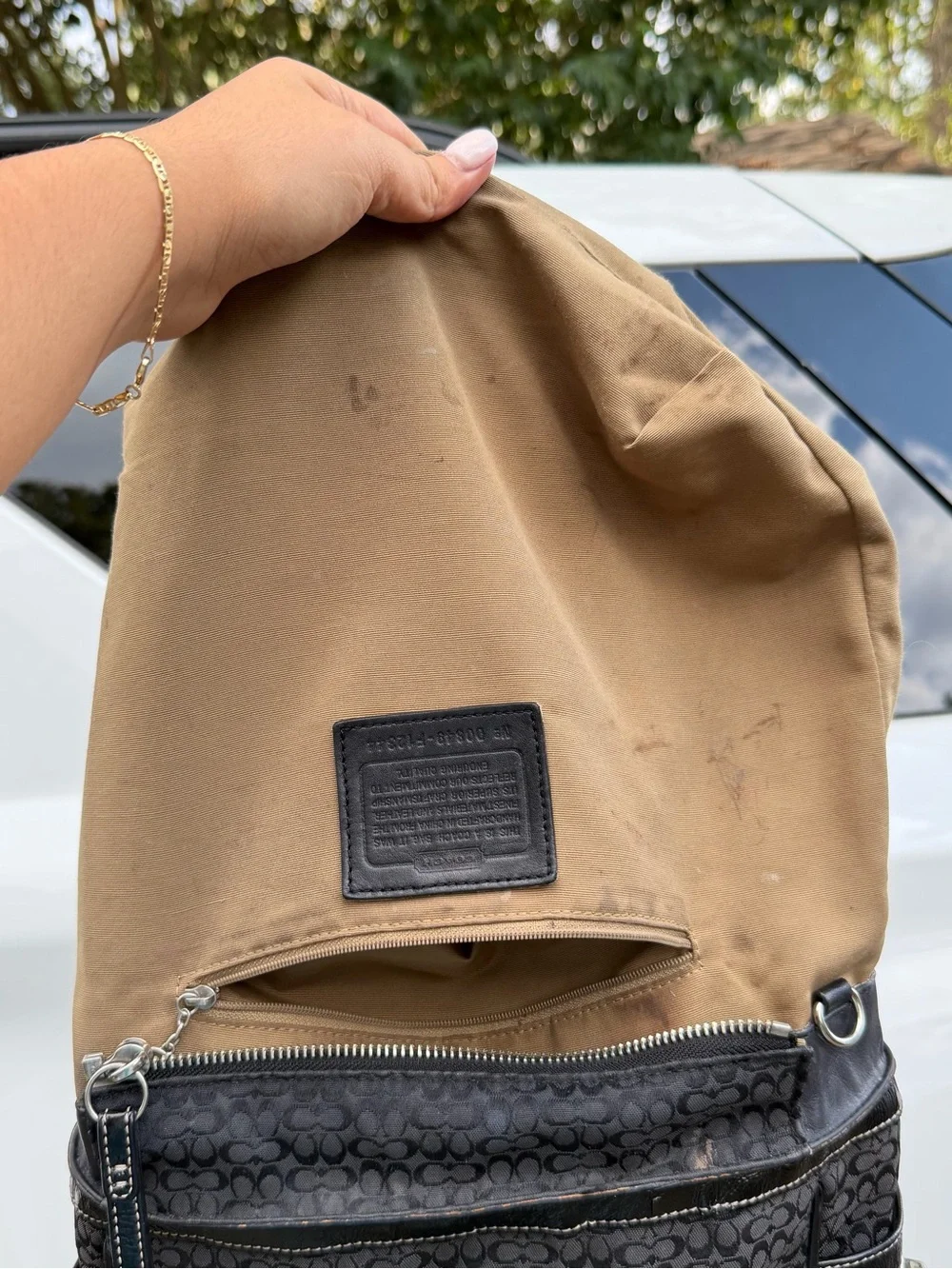 Coach Black Signature Canvas Shoulder Tote with Red Cherry Charm